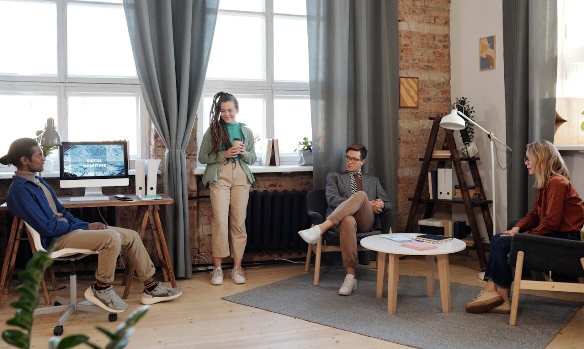 Business professionals in Canada reviewing a press release strategy and distribution plan on a laptop.